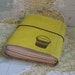 bucket list journal with maps featured in Better Homes and Gardens Gift Guide