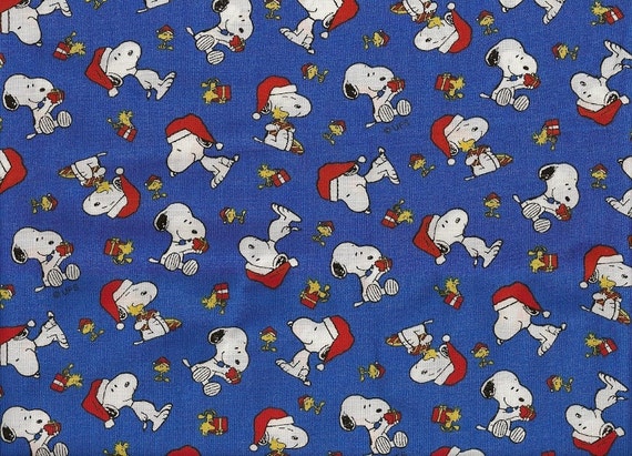 Charlie Brown Snoopy Christmas Santa Hat Fabric on blue 1 yard