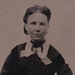 1800s Antique Victorian tintype portrait of a lady, ferrotype photograph.