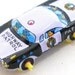 60s tin toy police car, vehicle in black & white.