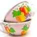 40s Tin Toy Tea Pitchers, Mixed fruit graphics on vintage metal by Ohio Art.