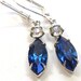 50s Rhinestone earrings, Sapphire blue stones on silver.