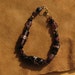 Purple and black glass beaded bracelet