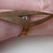 Vintage brass adjustable ring base. Unusual shape.