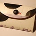 Wallet made from recycled milk carton