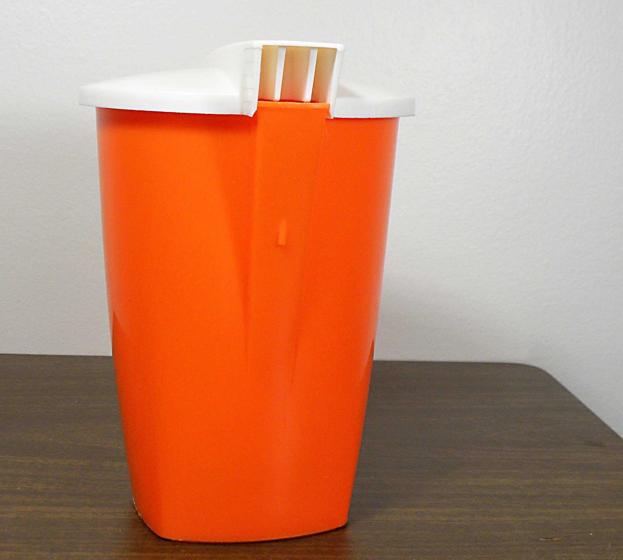 super orange plastic hospital water pitcher . . . bright but
