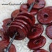 5 Round Beads In Aggie Maroon