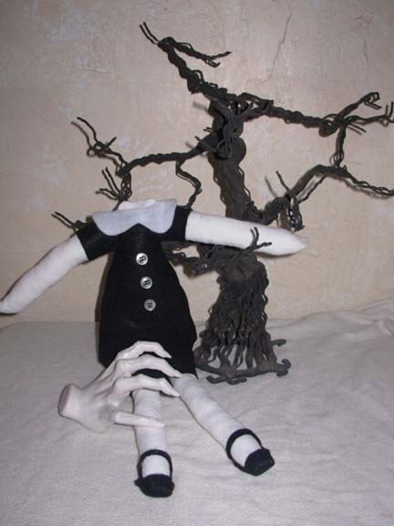 headless doll addams family