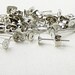 Earring Findings 20 Earstuds Stainless Steel Silver Pins with 20 Nickel Earnut Stoppers (1012ear12s1) ... last remaining packages