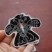 Intricate Three-Headed Bird with Energy Crystal Sticker