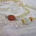 Sun and Moon crocheted beaded gemstone necklace in a celestial combination of citrine, carnelian, jade, and opalite