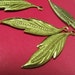 15 Vintage brass metal leaf charm finding beads gold color