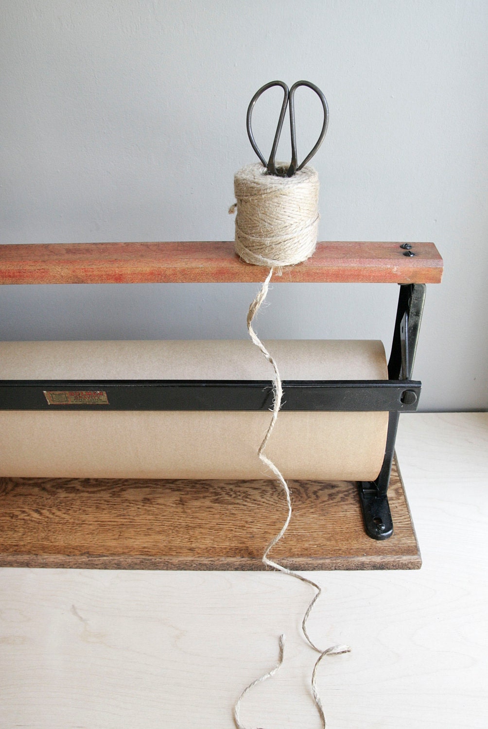 antique general store paper roll hanger