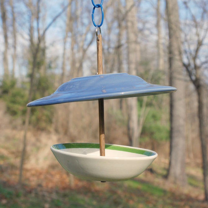 bird feeder made from recycled dishes