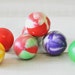 1980s vintage rainbow swirl colored gumball rubber balls--display, toy, art supplies