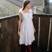 SOLD... Reserved... Vintage White Eyelet Dress // Embroidered Folk Trim Floral Ruffle