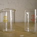 Two mini Pyrex glass beakers