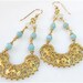Gold chandelier filigree and blue gemstone earrings. SERENITY