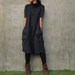 Last unit Tulip dress turtle neck...Black printed (one size fit most)