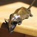Nosey mouse (bronze) 8 inches long, nose tip to tail tip.