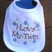 Cute embroidered bibs for twins.