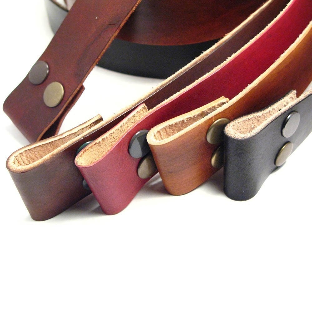 Leather snap belts . Belt buckles. Custom sizing. Hand dyed.