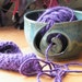 Blue yarn bowl with spiral cut-out and double dip rim