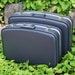 Blue Grey Pair of Vintage Nesting Hard Shell Suitcases