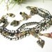Tourmaline bracelet one of a kind antique trade beads pink quartz sterling silver crocheted jeweled blossoms