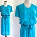 tEaL bLue inDie ChiFFon TieRed RuffLe sHeeR SecreTarY bLouSon sLouCh DollY DreSs with Belt. large . XL . D119