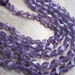 Amethyst Top drilled Twisted Teardrops Full Strand