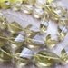 Lemon Topaz Twisted Teardrops FULL STRAND