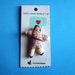 Tiny Stuffed Doll Brooch, Black Hair
