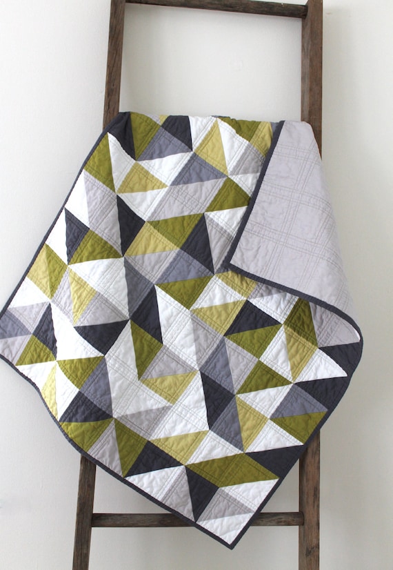 a modern geometric baby quilt.