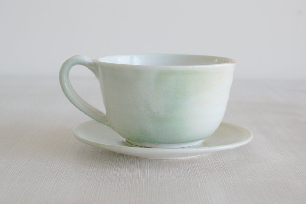 Ceramic Porcelain Cup and Saucer in Cream and by jansonpottery