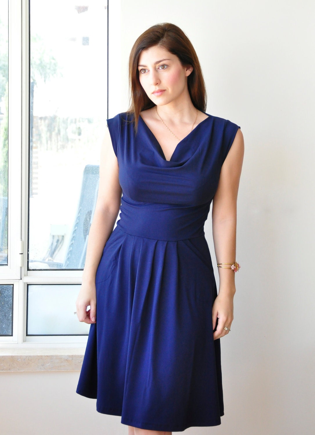 Sleeveless Navy Blue Dress With Pleated Skirt And Cowl Neck