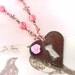 Roses and Rust heart escutcheon wire wrapped necklace