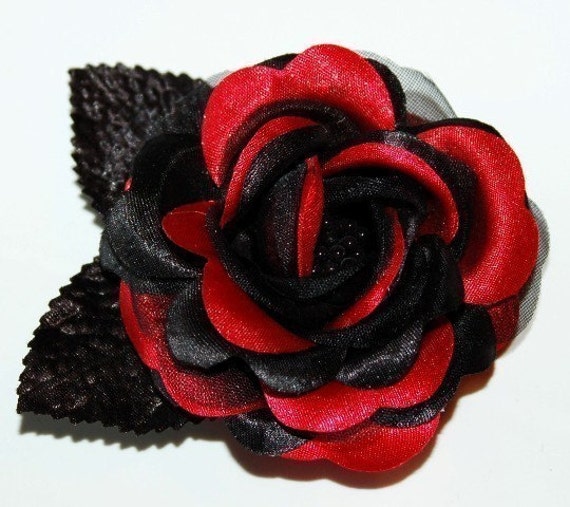 Black Rose Hair Clip Put it in your hair for extra flair. Alligator clasp hair clip with black and grey rose design. 4 1/4