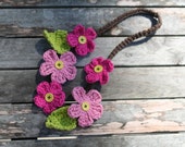 crocheted flower necklace for little girls in pink by yourmomdesigns removable buttons learning toy