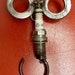 Oughtty Spark Plug Metal wall art sculpture