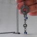 Sterling Silver Necklace. Asymmetric whimsical pendant with lapis lazuli -Motley line-