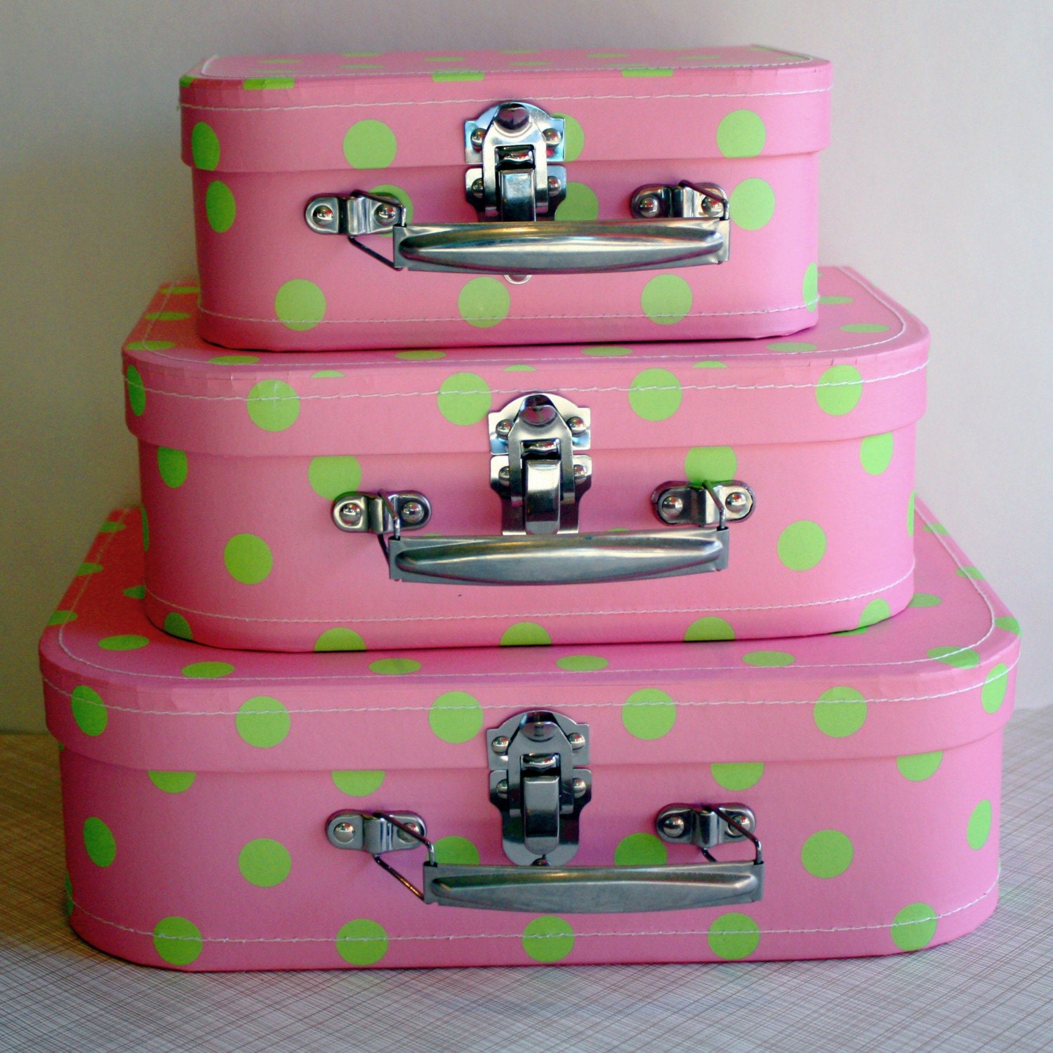 Stiched paperboard Suitcases in Pink Set of 3 nested