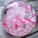 Hand Blown Art Glass Paperweight in Pink and White by Bill Riker