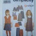Simplicity 9854 - Sewing Pattern for Girls Pants, Skirt, Jumper and Jacket or Vest in Sizes 2, 3, 4, 5, 6, 6X- New and Uncut