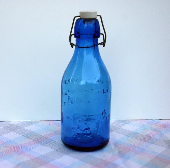 Rare vintage blue glass milk bottle