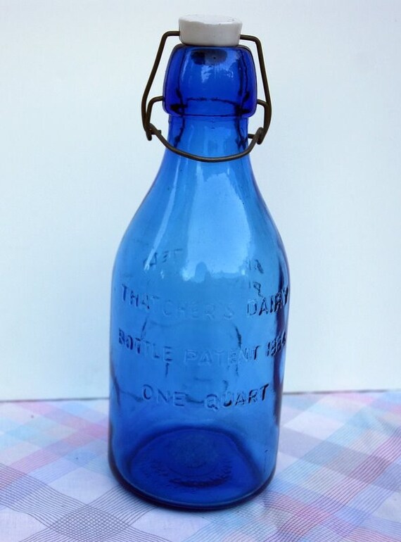 Rare vintage blue glass milk bottle