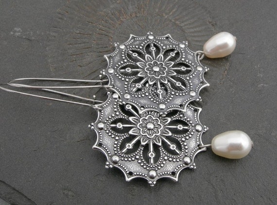 Snowflake. Filigree silver element with a white Swarovski Pearl. Feminine, elegant and festive Earrings. Long dangling earrings by Maymana steampunk buy now online