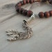 Gypsy Mala Bracelet - Wood with and Metal Tassel with Vintage Tribal Button