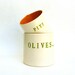 olives and pits  ....  hand built porcelain containers ...  vessels