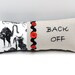 hand embroidered pillow- ''BACK OFF'' on linen with angry cats print